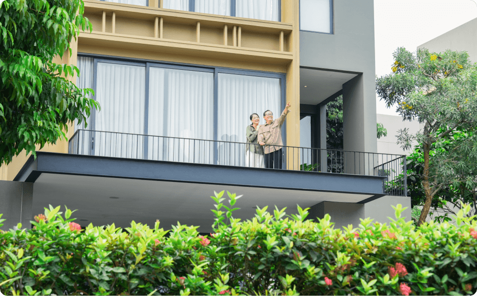the couple smiling in building